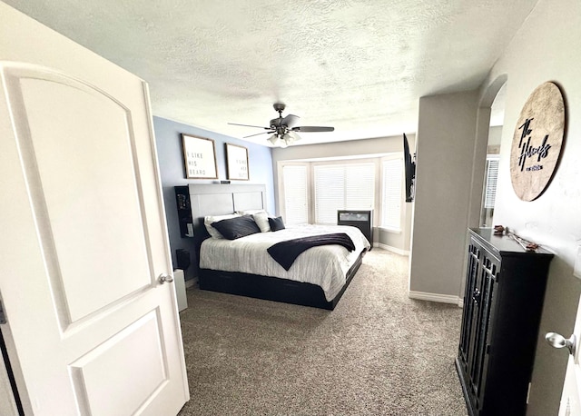 8675 N Franklin Dr E, Eagle Mountain, UT 84005 - bedroom featuring ceiling fan, carpet floors, a textured ceiling, and baseboards