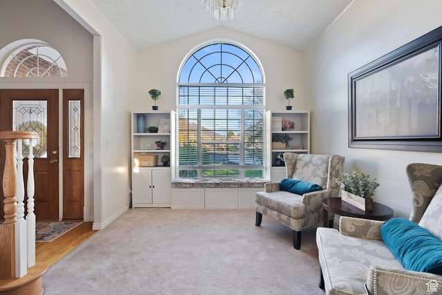 1380 S 980 E, Spanish Fork, UT 84660 - sitting room featuring vaulted ceiling, wood finished floors, carpet, and an inviting chandelier
