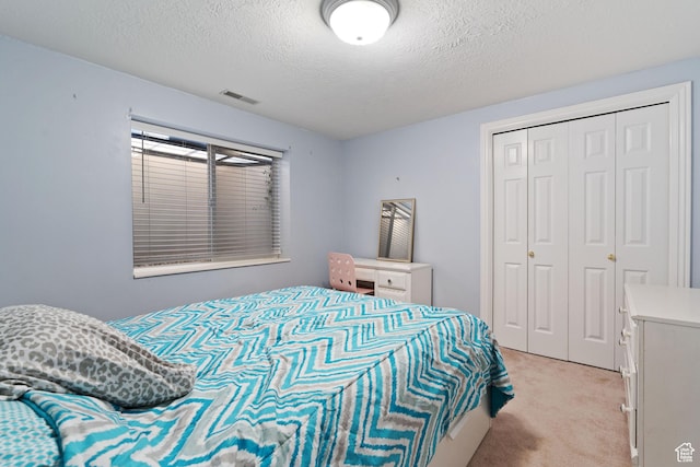 1380 S 980 E, Spanish Fork, UT 84660 - bedroom with light colored carpet, a textured ceiling, visible vents, and a closet