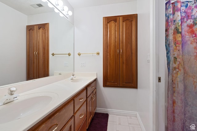 1380 S 980 E, Spanish Fork, UT 84660 - full bathroom with baseboards, a sink, visible vents, and double vanity