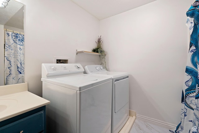 1380 S 980 E, Spanish Fork, UT 84660 - laundry room featuring separate washer and dryer, baseboards, marble finish floor, and laundry area