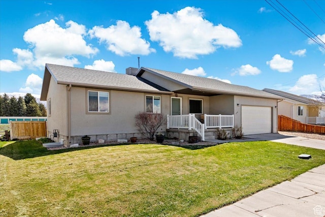 606 N 200 W, Ephraim, UT 84627 - ranch-style house with fence, driveway, covered porch, and a garage