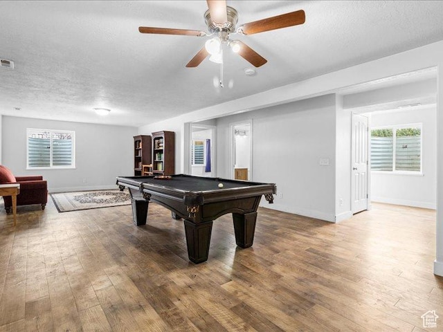 606 N 200 W, Ephraim, UT 84627 - rec room featuring a textured ceiling, pool table, ceiling fan, wood-type flooring, and baseboards