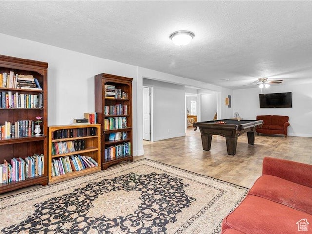 606 N 200 W, Ephraim, UT 84627 - playroom featuring a ceiling fan, wood finished floors, a textured ceiling, and billiards