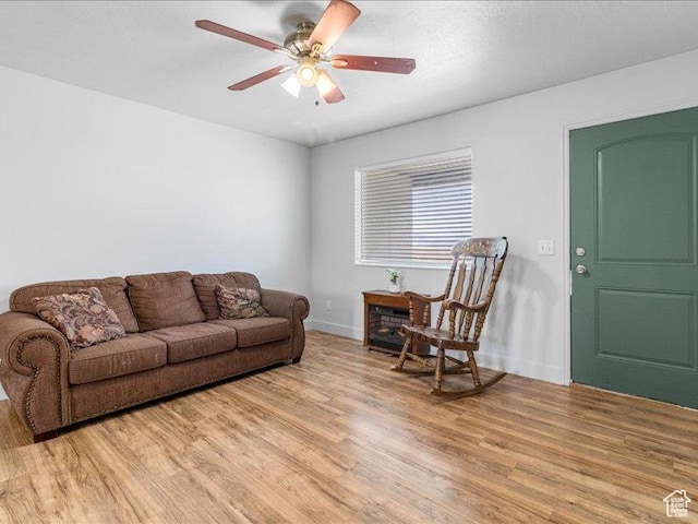 606 N 200 W, Ephraim, UT 84627 - living area with light wood-style flooring, baseboards, and ceiling fan