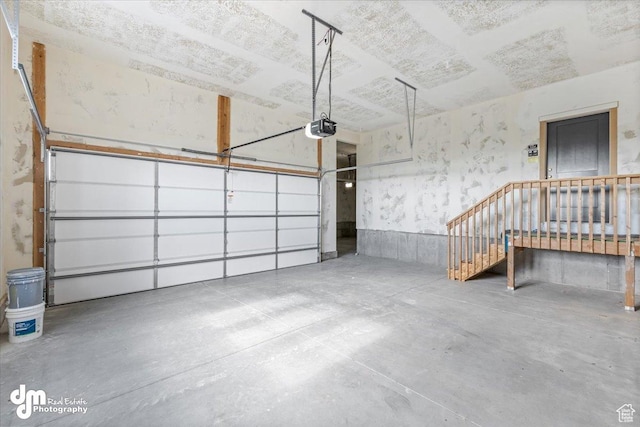 garage featuring a garage door opener