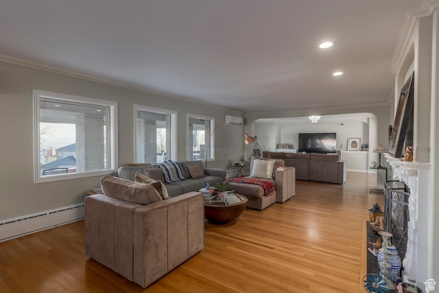 381 E 11th Ave, Salt Lake City, UT 84103 - living area featuring light wood-style floors, an AC wall unit, and ornamental molding