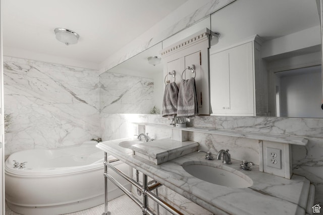 381 E 11th Ave, Salt Lake City, UT 84103 - bathroom with a bath, a sink, double vanity, tile walls, and decorative backsplash