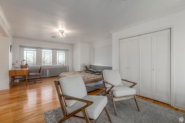 381 E 11th Ave, Salt Lake City, UT 84103 - living area featuring light wood-style floors and crown molding
