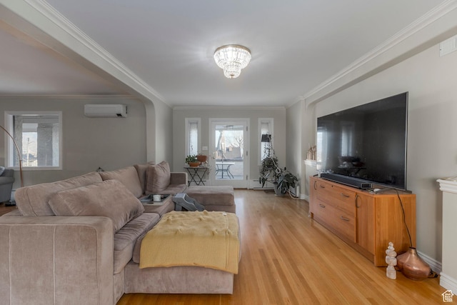 381 E 11th Ave, Salt Lake City, UT 84103 - living room with light wood-type flooring, ornamental molding, a wealth of natural light, and a wall unit AC