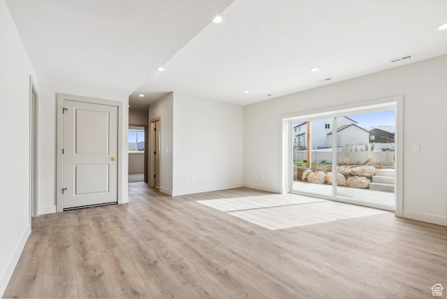 178 N Husker Ln Unit 2, Saratoga Springs, UT 84043 - spare room with recessed lighting, baseboards, visible vents, and light wood-type flooring
