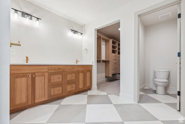 178 N Husker Ln Unit 2, Saratoga Springs, UT 84043 - full bath with toilet, tile patterned floors, visible vents, and baseboards