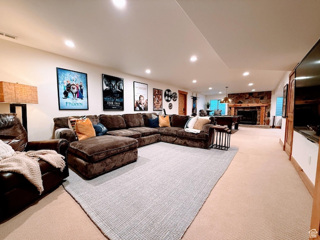 2605 E Woodland Way, Woodland, UT 84036 - living area with light colored carpet, a stone fireplace, visible vents, and recessed lighting