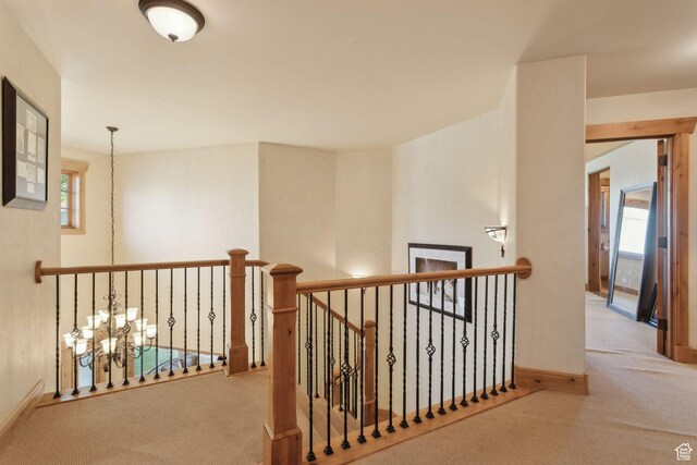 2605 E Woodland Way, Woodland, UT 84036 - hall featuring carpet, an upstairs landing, and baseboards