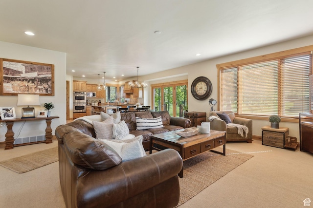 2605 E Woodland Way, Woodland, UT 84036 - living area with light colored carpet, recessed lighting, and a chandelier