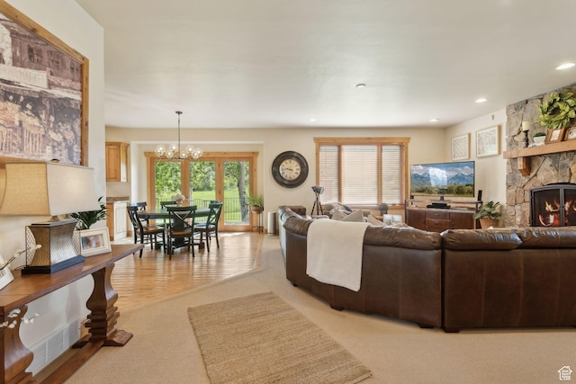 2605 E Woodland Way, Woodland, UT 84036 - living area with a chandelier, light colored carpet, a fireplace, and recessed lighting