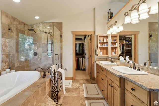 2605 E Woodland Way, Woodland, UT 84036 - bathroom featuring a shower stall, a spacious closet, double vanity, a garden tub, and recessed lighting