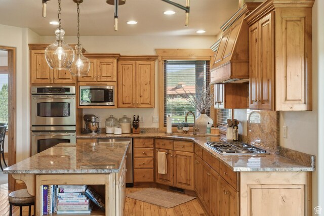 2605 E Woodland Way, Woodland, UT 84036 - kitchen featuring appliances with stainless steel finishes, a sink, light wood finished floors, custom range hood, and recessed lighting