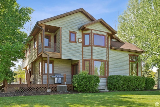 2605 E Woodland Way, Woodland, UT 84036 - back of house featuring a balcony, central air condition unit, and a yard