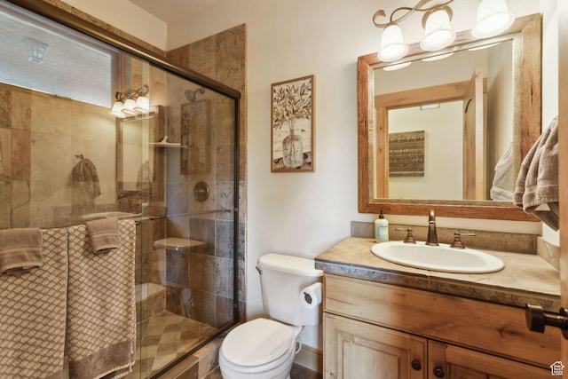 2605 E Woodland Way, Woodland, UT 84036 - bathroom with toilet, vanity, and a stall shower