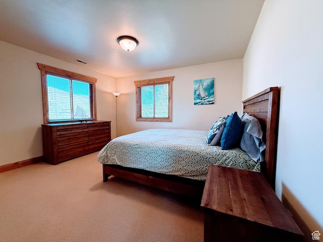 2605 E Woodland Way, Woodland, UT 84036 - bedroom featuring baseboards, a fireplace, visible vents, and carpet