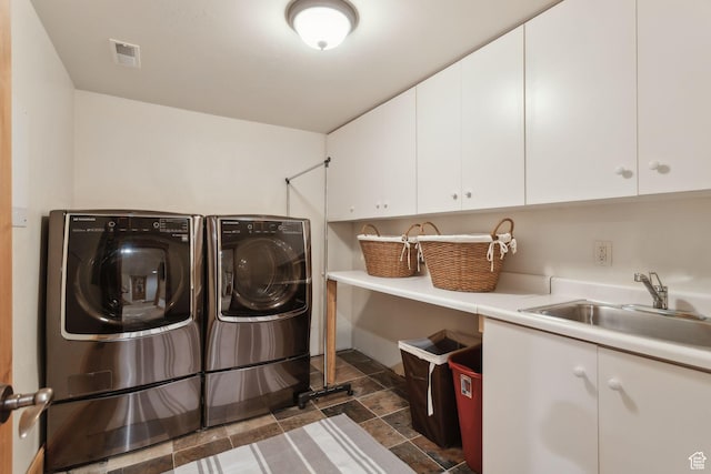 2605 E Woodland Way, Woodland, UT 84036 - laundry area with cabinet space, separate washer and dryer, and dark stone finish floors