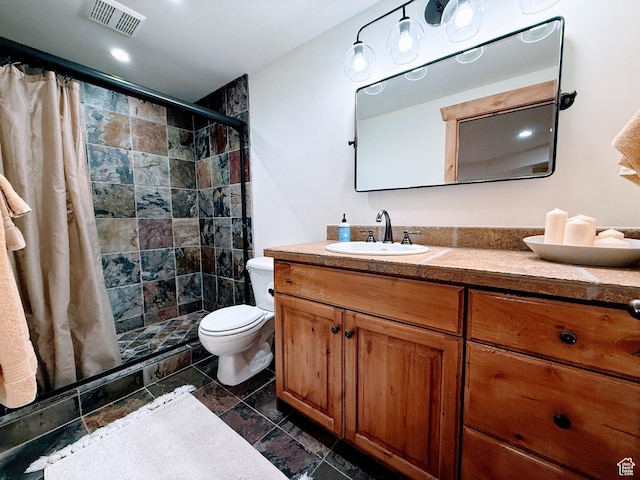 2605 E Woodland Way, Woodland, UT 84036 - full bathroom with toilet, vanity, visible vents, and tiled shower