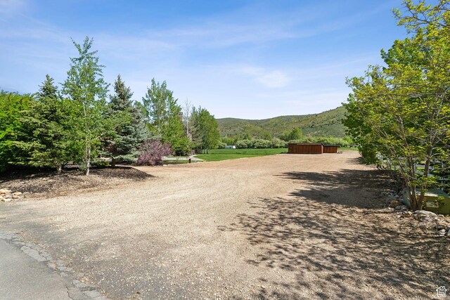 2605 E Woodland Way, Woodland, UT 84036 - view of dirt / gravel road with a mountain view and an outbuilding