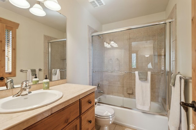 2605 E Woodland Way, Woodland, UT 84036 - bathroom featuring toilet, vanity, and shower / bath combination with glass door
