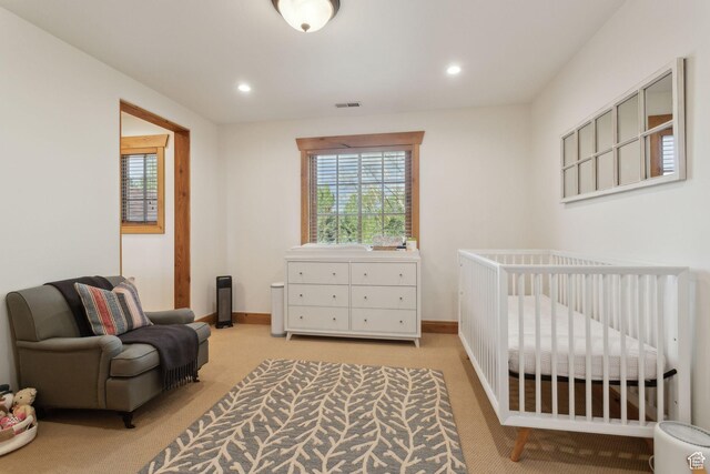 2605 E Woodland Way, Woodland, UT 84036 - bedroom featuring light colored carpet, recessed lighting, a crib, and baseboards