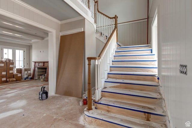 staircase with ornamental molding
