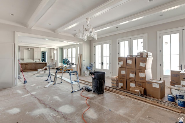 miscellaneous room with beamed ceiling, an inviting chandelier, crown molding, and french doors