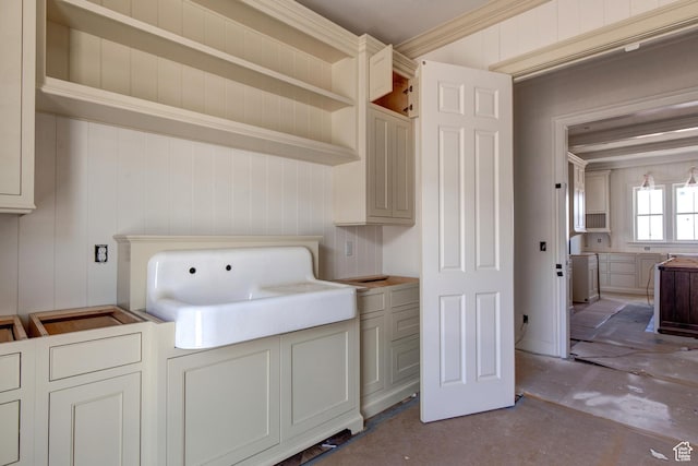 clothes washing area featuring a sink and laundry area