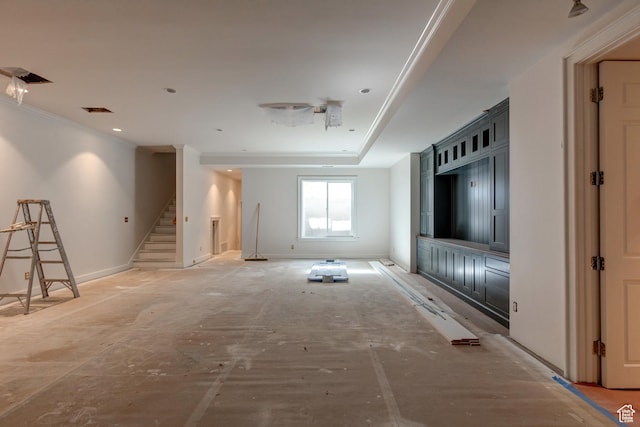 unfurnished living room with stairway, baseboards, crown molding, and visible vents