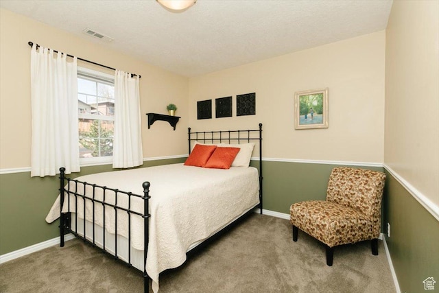770 Orchard Dr, River Heights, UT 84321 - carpeted bedroom featuring baseboards and visible vents