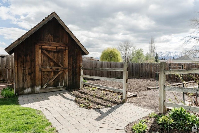 770 Orchard Dr, River Heights, UT 84321 - view of shed featuring a fenced backyard
