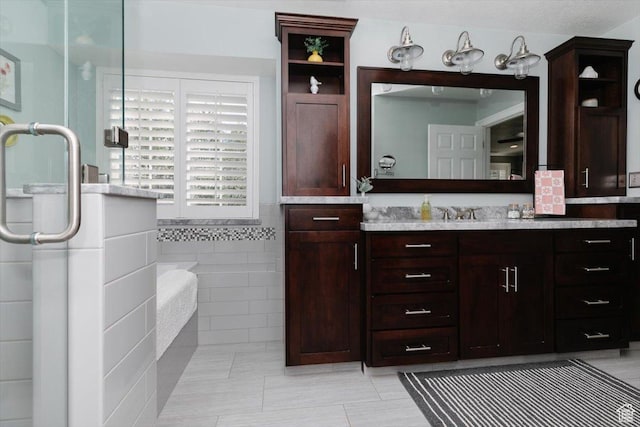 770 Orchard Dr, River Heights, UT 84321 - bathroom with tile walls, tile patterned floors, and vanity