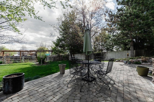 770 Orchard Dr, River Heights, UT 84321 - view of patio with outdoor dining space and a fenced backyard