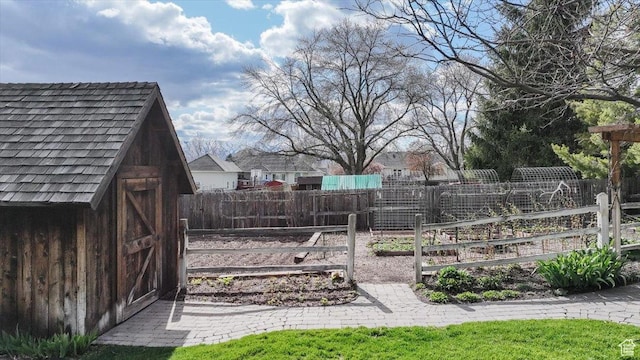770 Orchard Dr, River Heights, UT 84321 - view of yard with an outbuilding, a shed, and fence