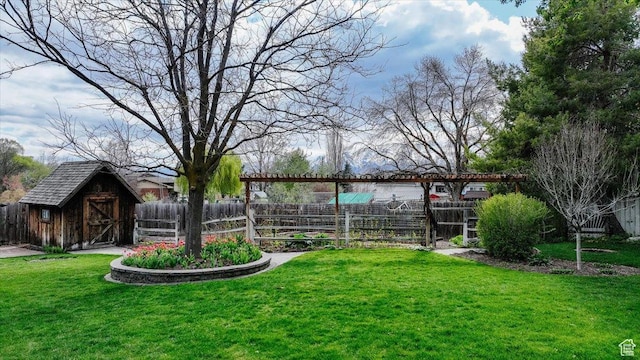 770 Orchard Dr, River Heights, UT 84321 - view of yard featuring an outbuilding, a shed, and fence