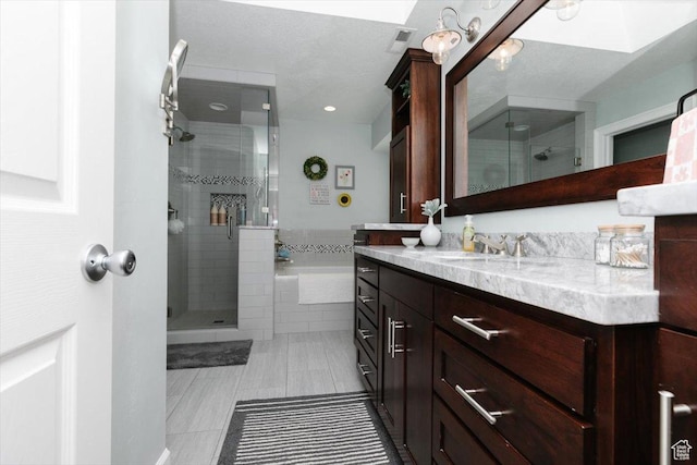 770 Orchard Dr, River Heights, UT 84321 - bathroom with a shower stall, visible vents, tile patterned flooring, and vanity