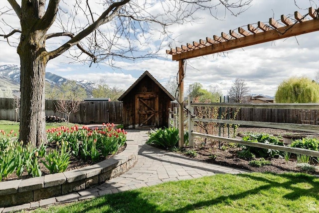 770 Orchard Dr, River Heights, UT 84321 - view of shed with a fenced backyard