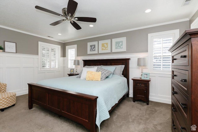 770 Orchard Dr, River Heights, UT 84321 - bedroom with wainscoting, a decorative wall, and light carpet