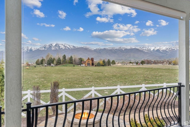mountain view featuring a rural view