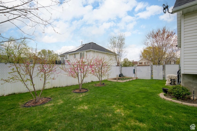 1426 N Quincy Ave, Ogden, UT 84404 - view of yard with a fenced backyard and a garden