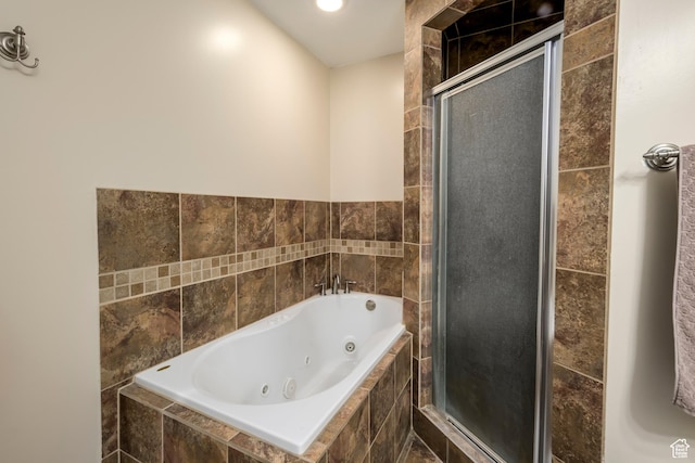 1426 N Quincy Ave, Ogden, UT 84404 - bathroom with a shower stall and a tub with jets