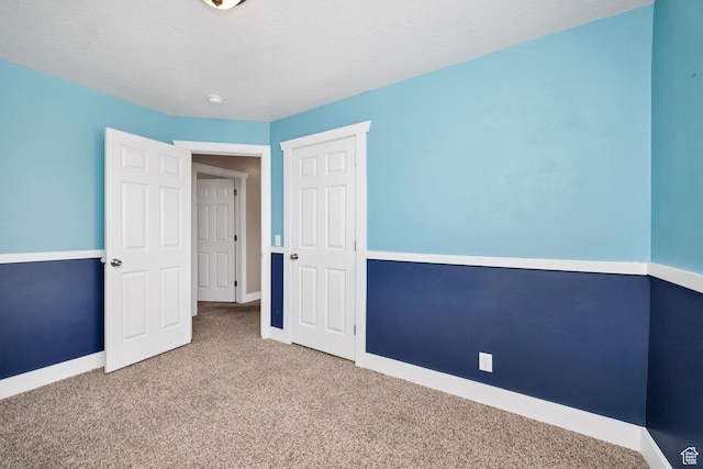 818 W 530 S, Logan, UT 84321 - unfurnished bedroom featuring carpet flooring and baseboards