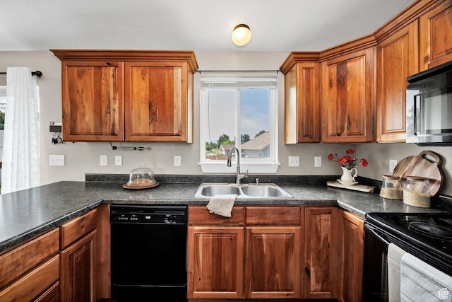 818 W 530 S, Logan, UT 84321 - kitchen with black appliances, dark countertops, and brown cabinetry