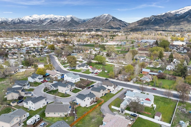 818 W 530 S, Logan, UT 84321 - aerial overview of property's location with a mountain backdrop and nearby suburban area