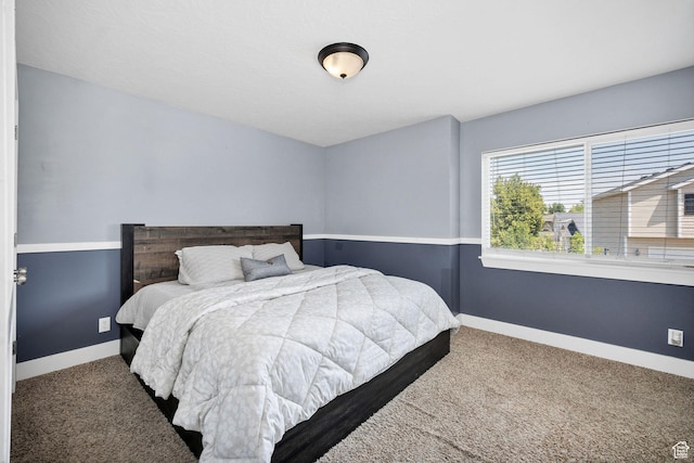 818 W 530 S, Logan, UT 84321 - carpeted bedroom featuring baseboards